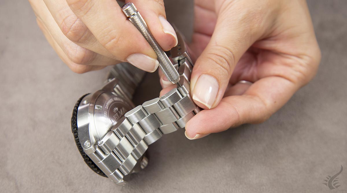 como ajustar un brazalete